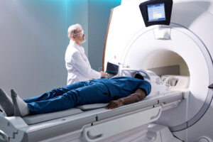 Man being moved into an MRI machine.